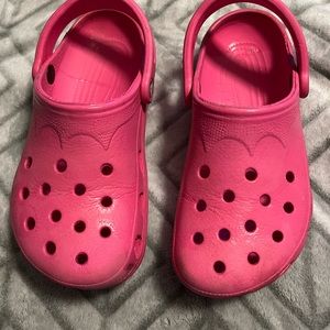 Pink crocs